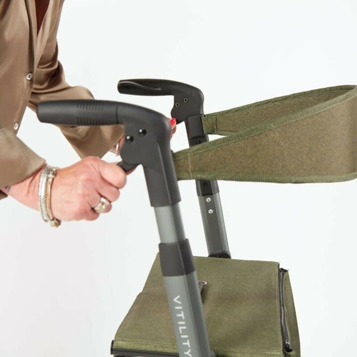 Grøn rollator, ergonomisk og kompakt, ergonominen ja kompakti