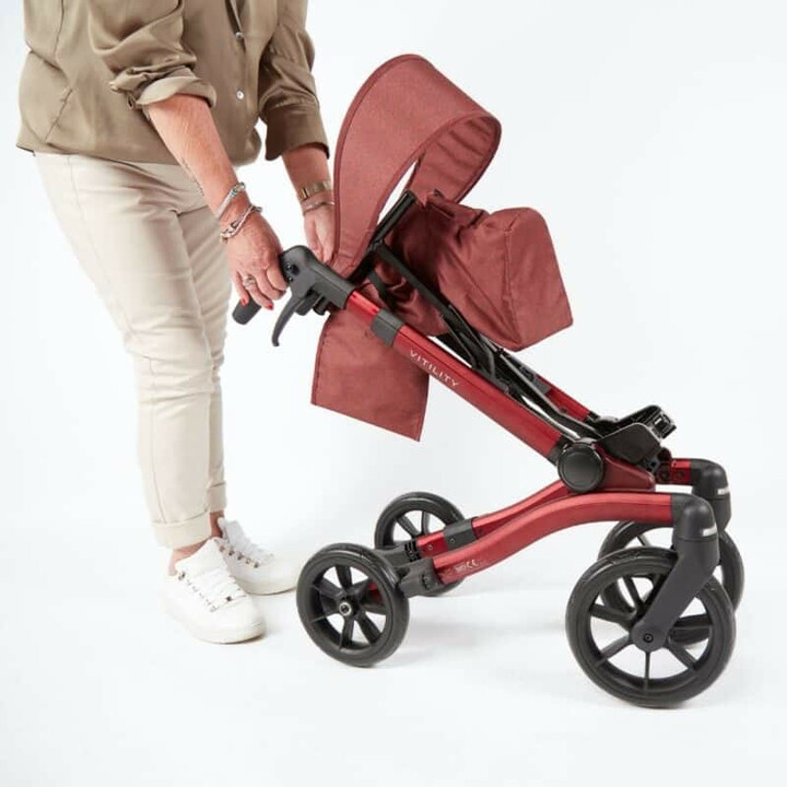 Rød rollator, ergonomisk og kompakt, ergonominen ja kompakti