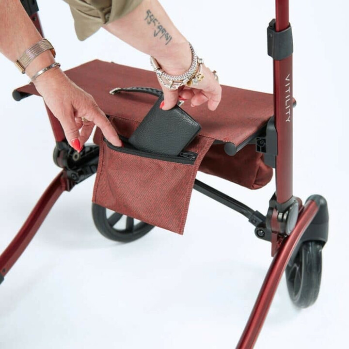 Rød rollator, ergonomisk og kompakt, ergonominen ja kompakti