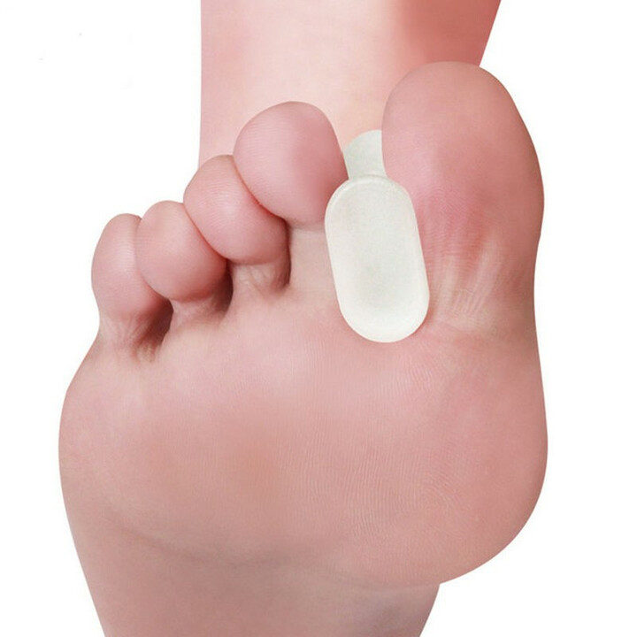 Silikone tåseparator med kraver